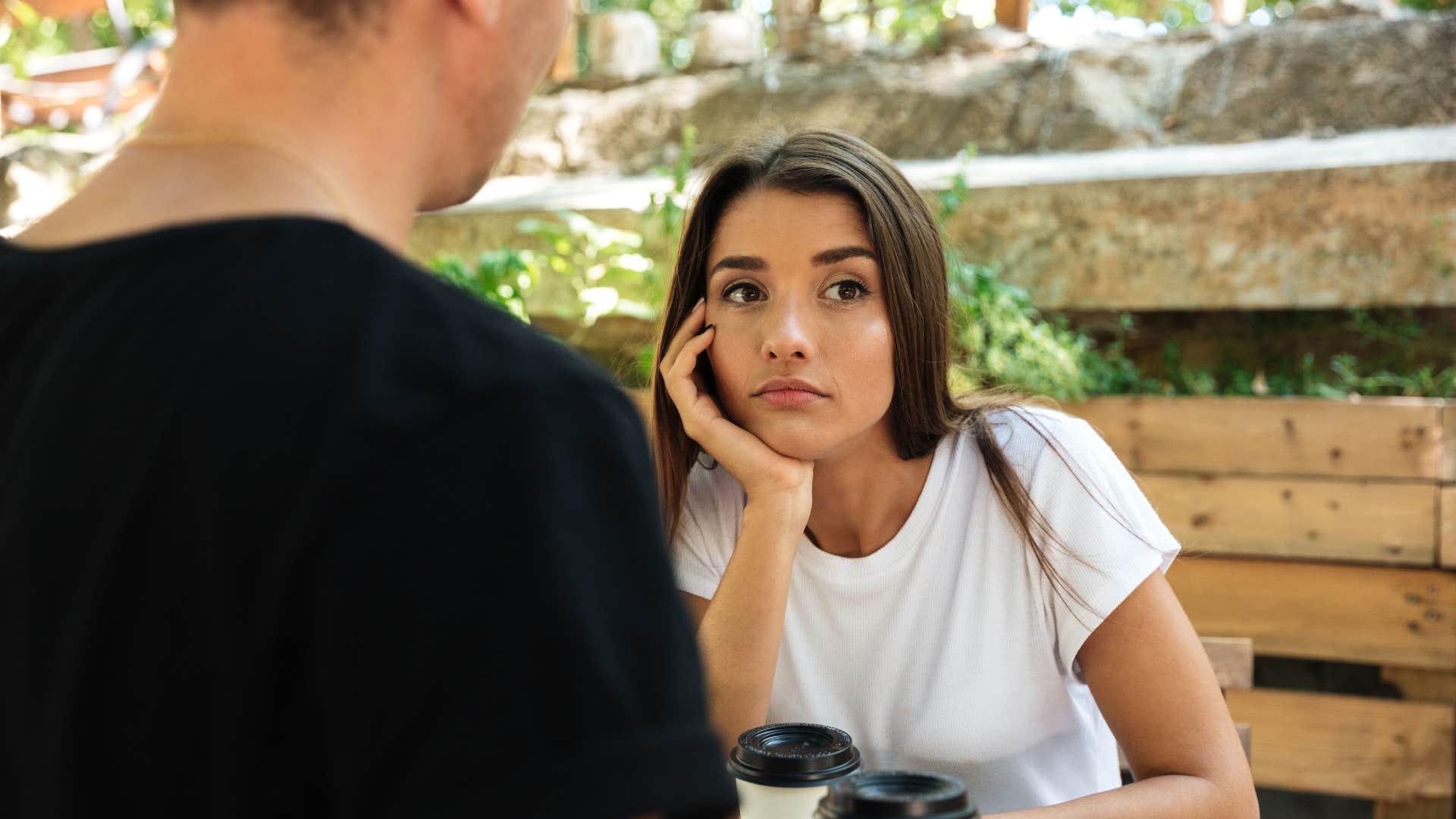 woman feeling socially disconnected from friend