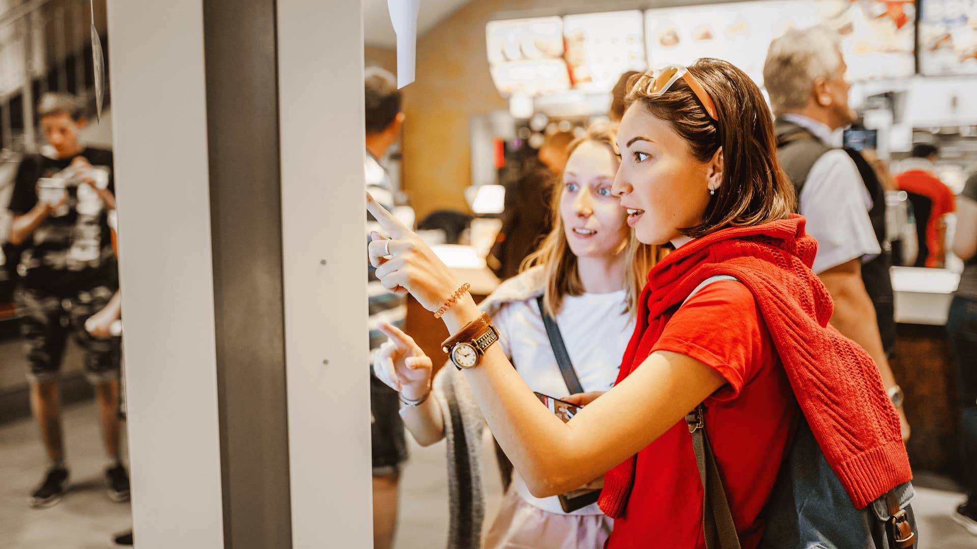 woman buying Fast food before she finally made enough money to know better