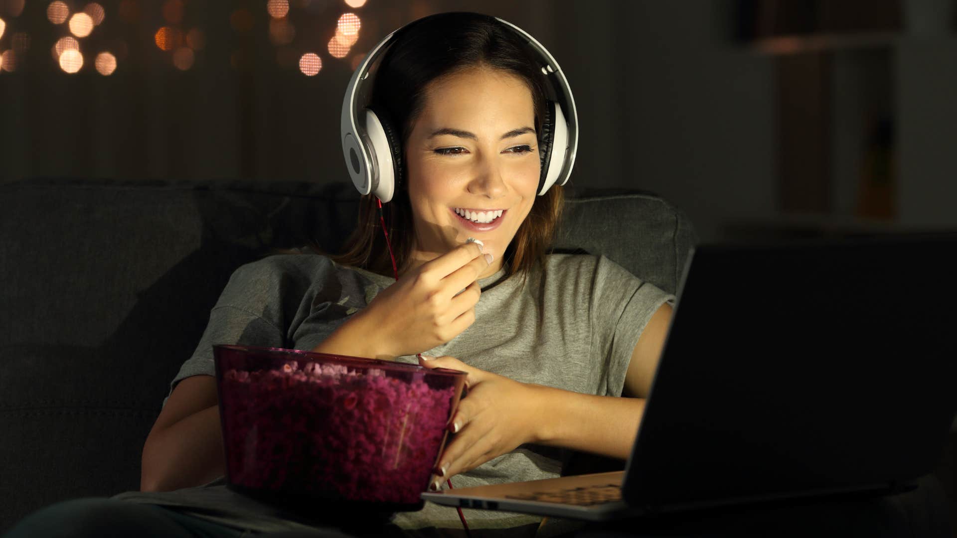 woman without cable tv streaming on her laptop