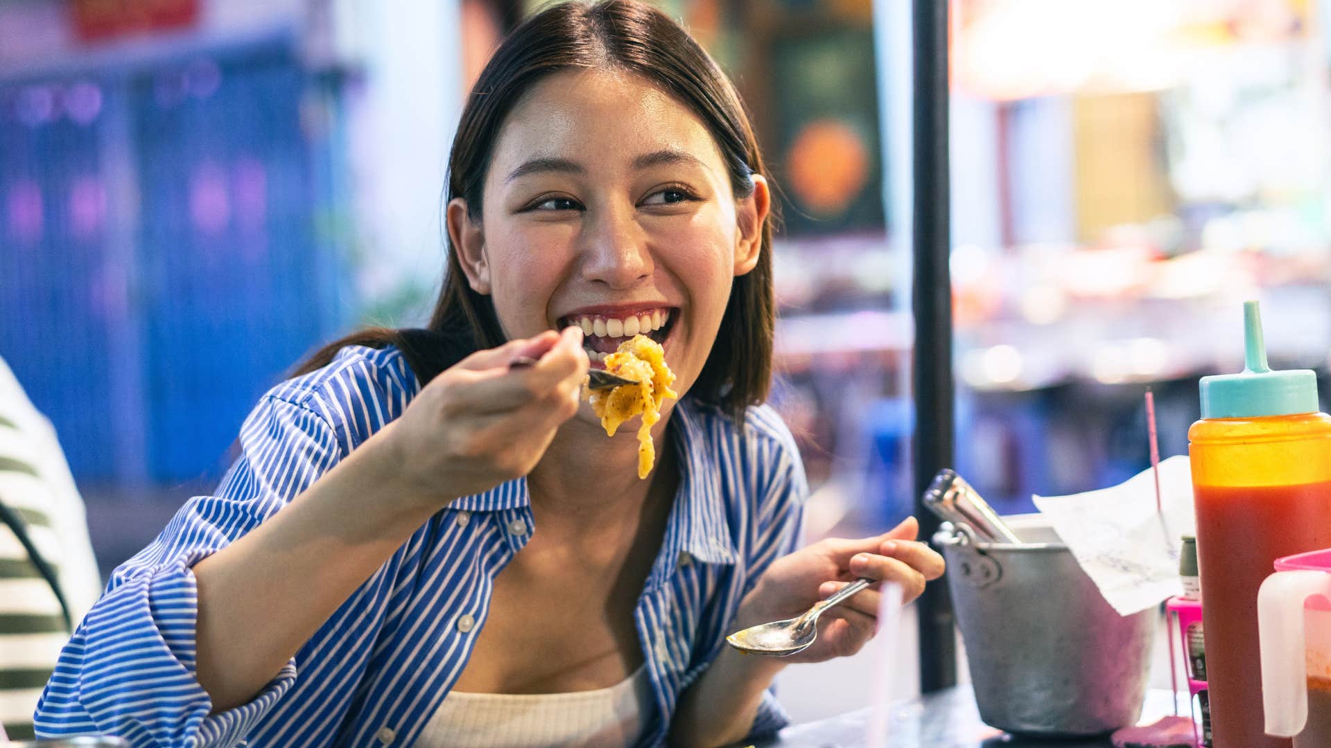 young woman not eating at formal dining sets