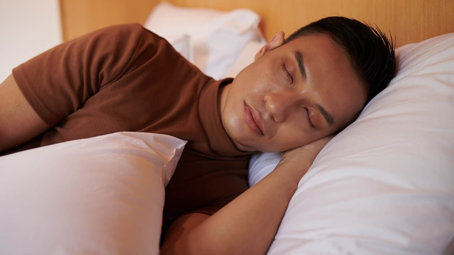 young man not sleeping on a waterbed