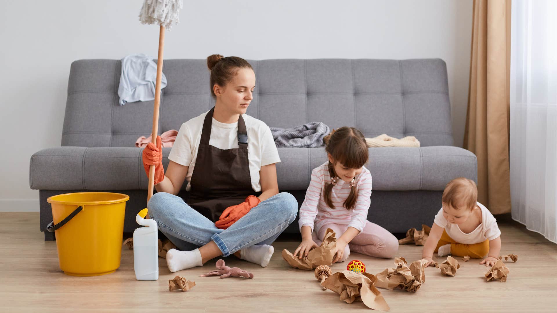 a woman is upset that she has uninvited guests because she now has to clean up after them