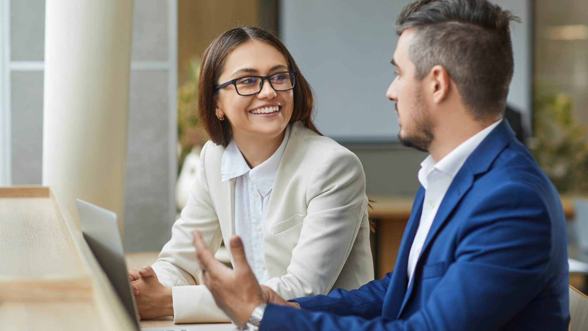 woman name-dropping often to her co-worker