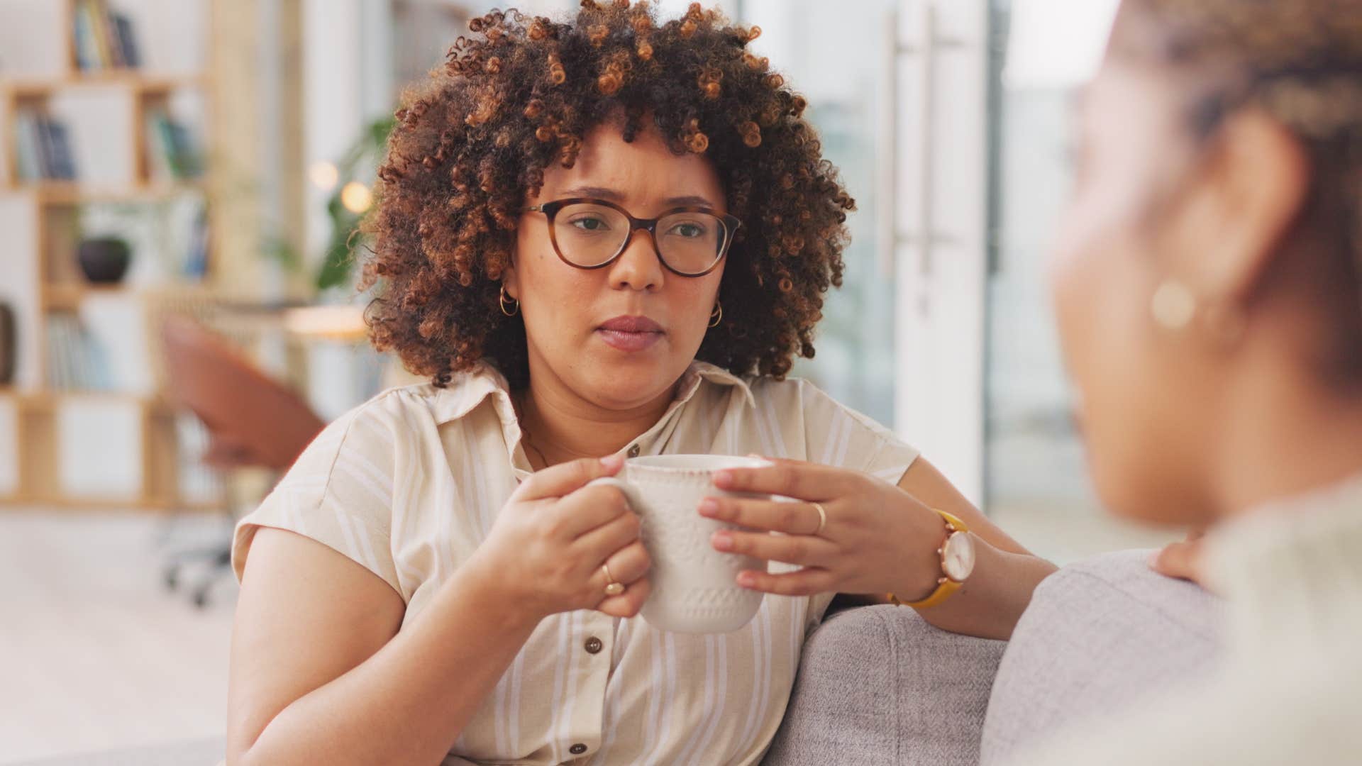 woman listening to friend give unsolicited advice