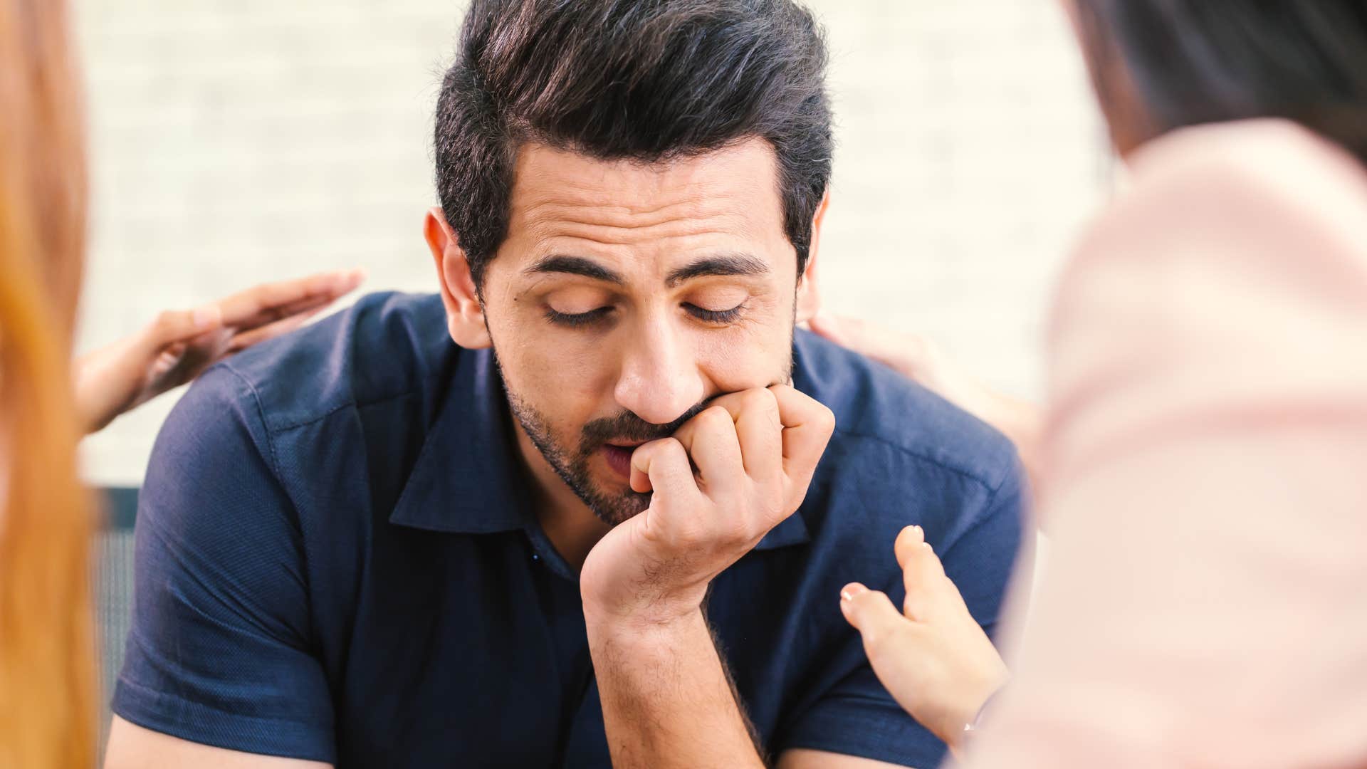 woman comforting man as he trauma dumps