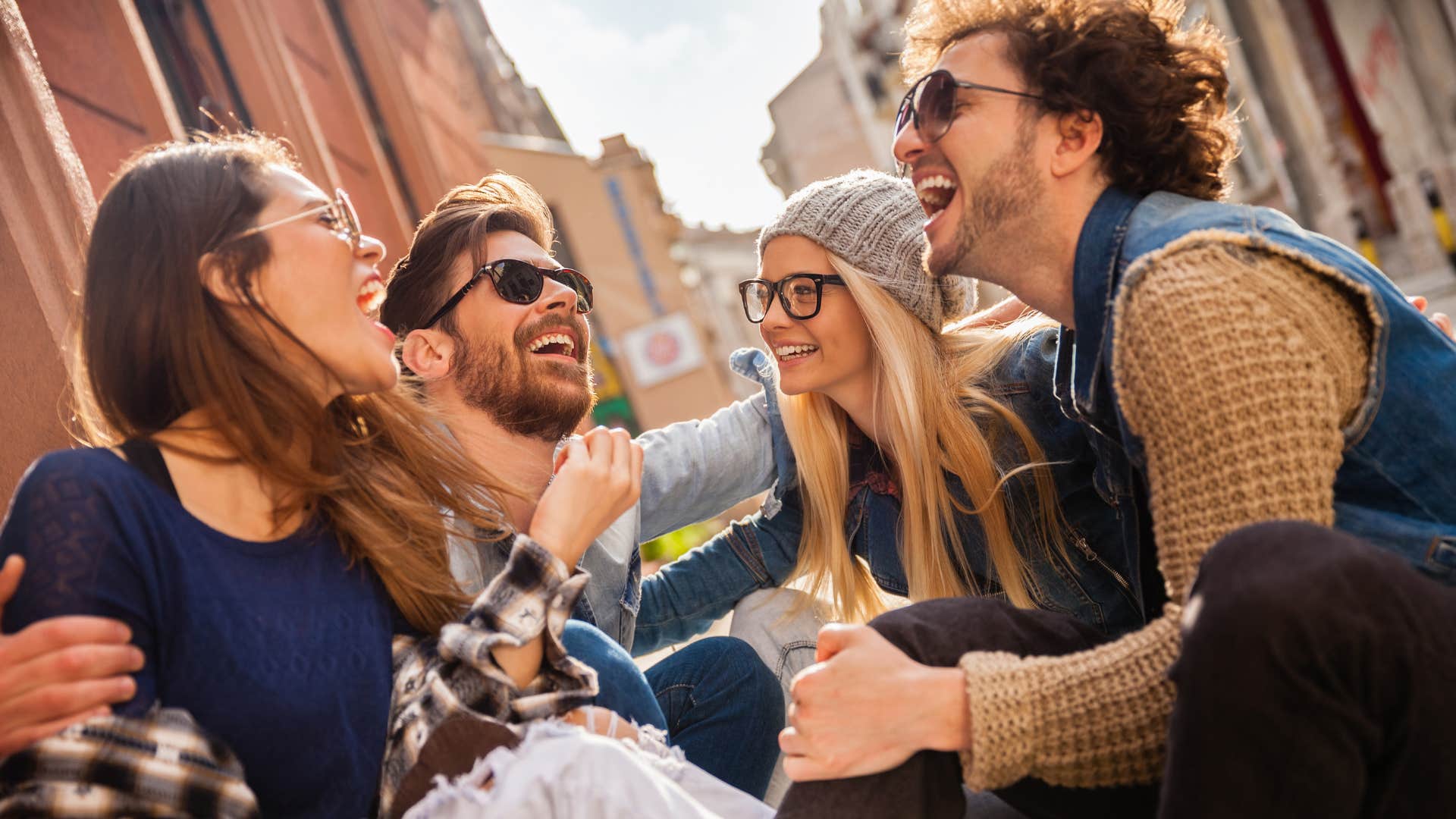 friends doing a group activity laughing