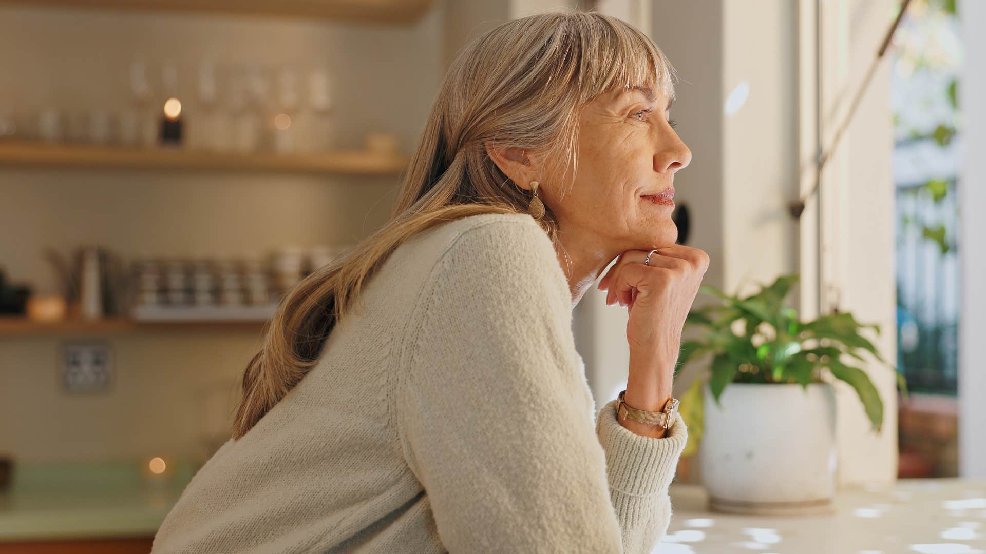 wealthy woman enjoying free time in her home