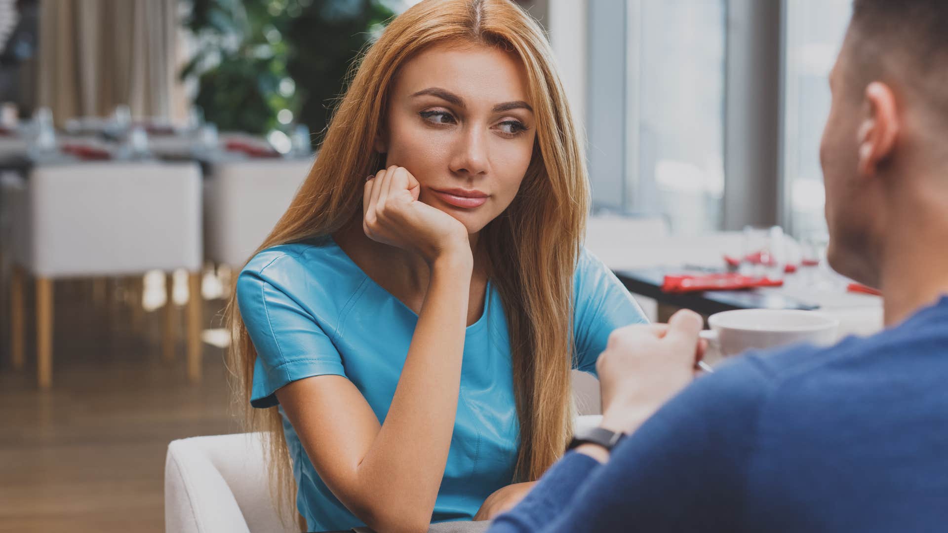 Woman with passive ideas about money talking to an upset man.