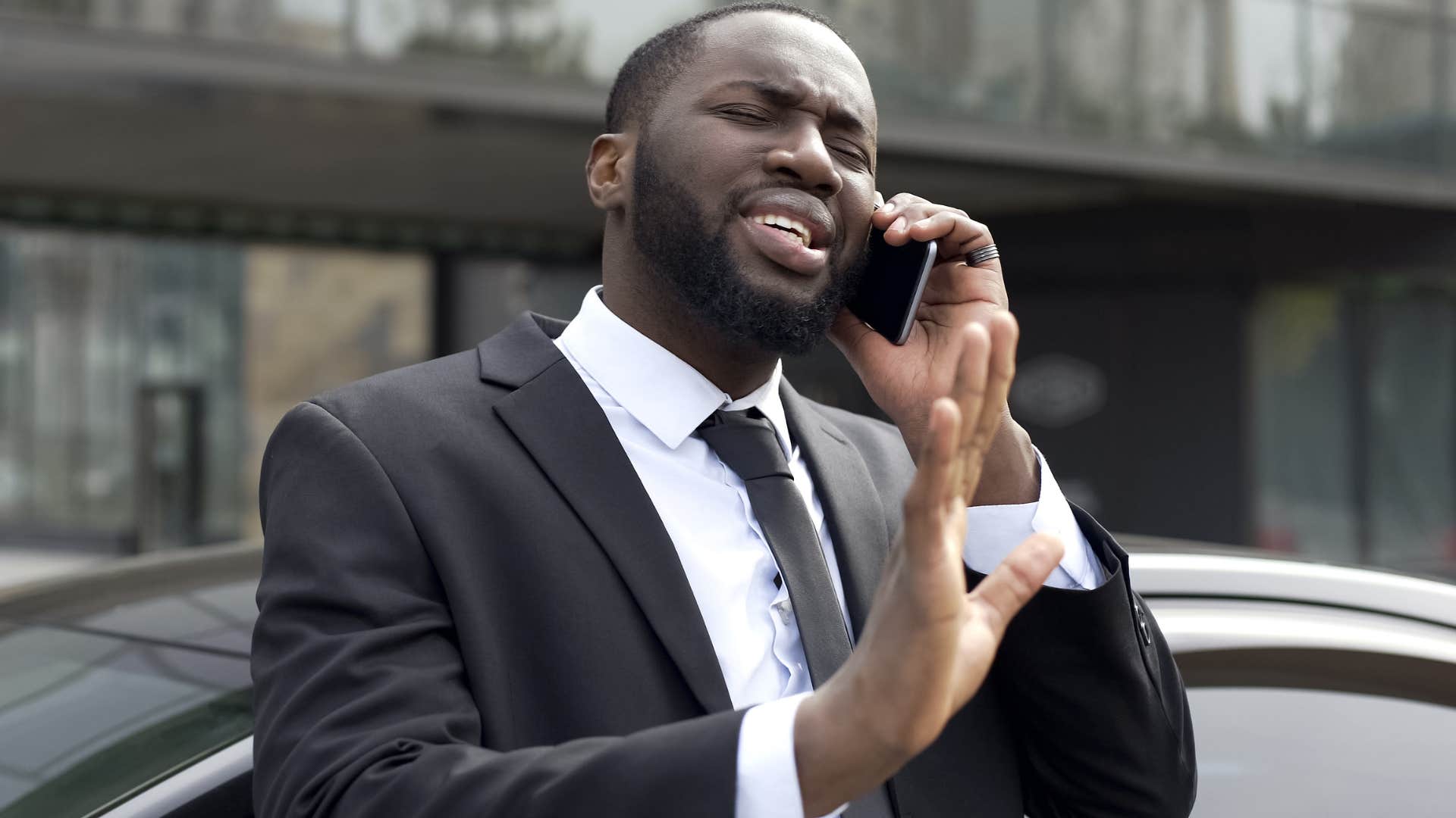 Privileged person without gratitude arguing on the phone.
