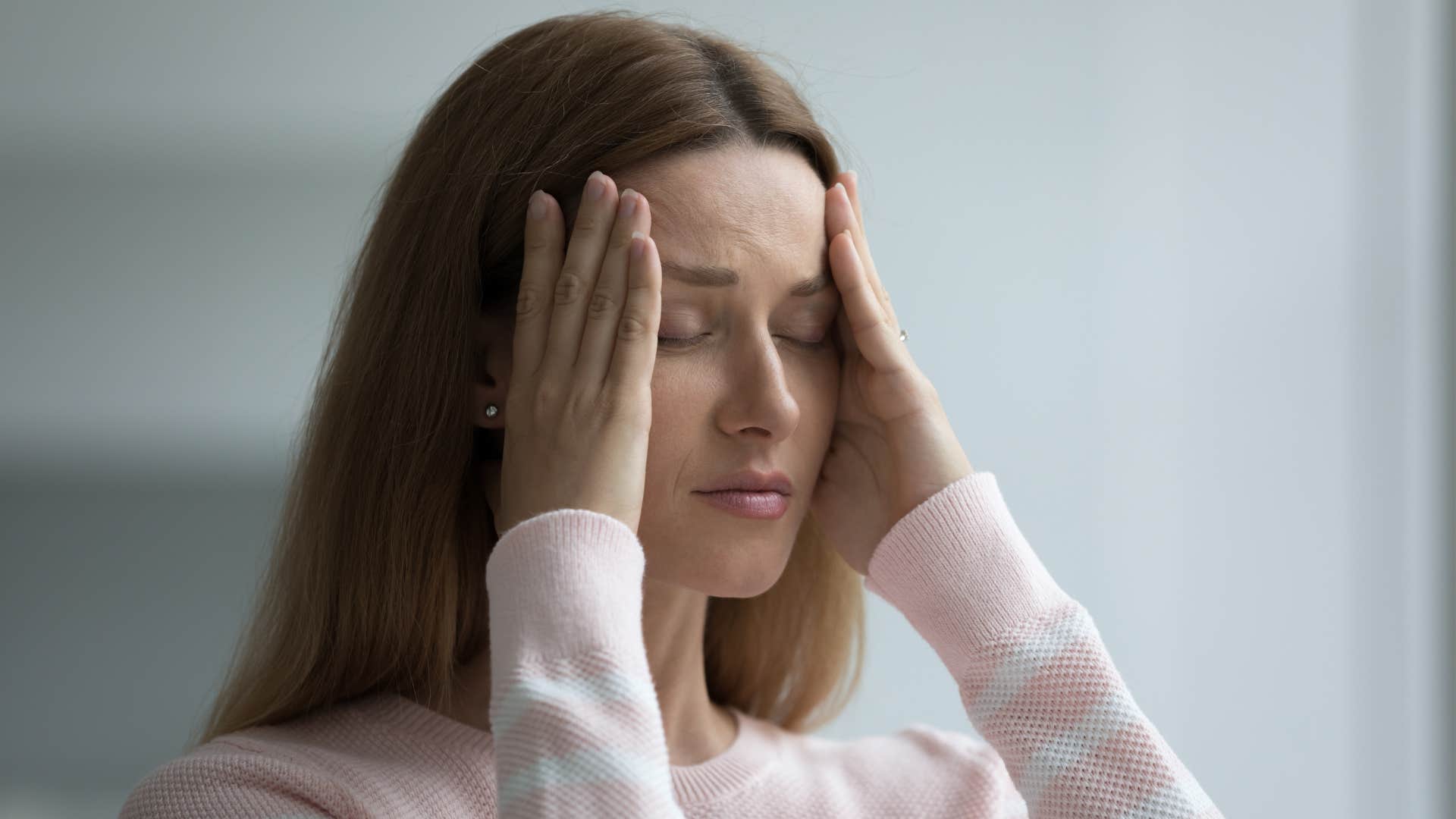 a woman has a difficult time concentrating on anything