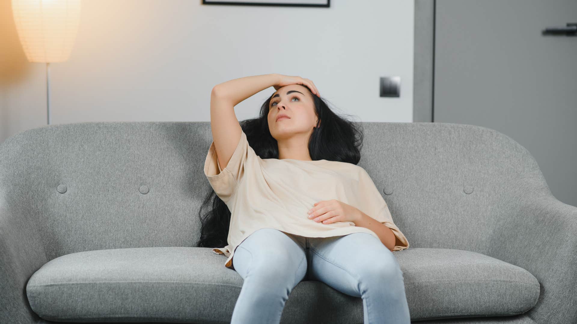 a woman experiences body aches and feels like she is getting sick but it is just burnout
