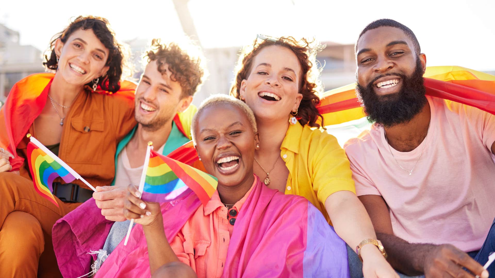 a group of gen zers proudly display their support for their community