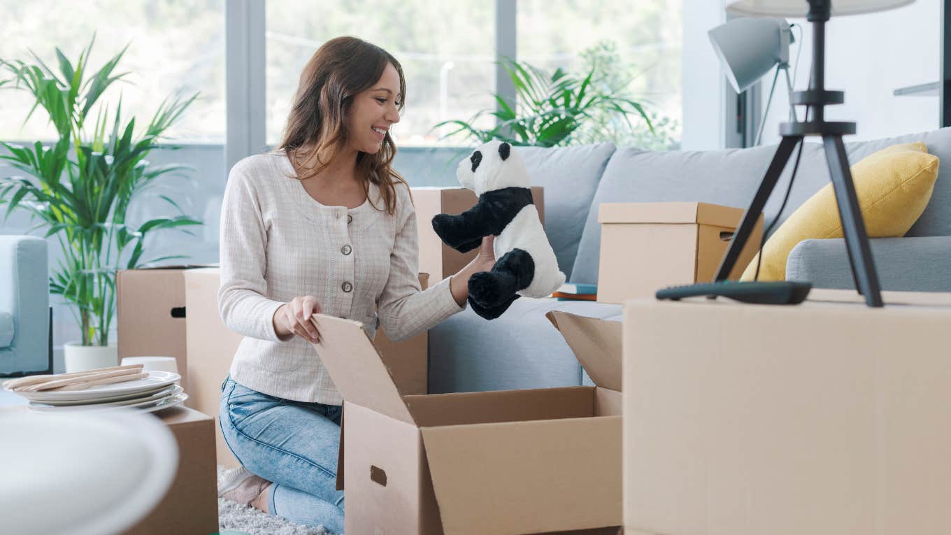 woman going through clutter at home