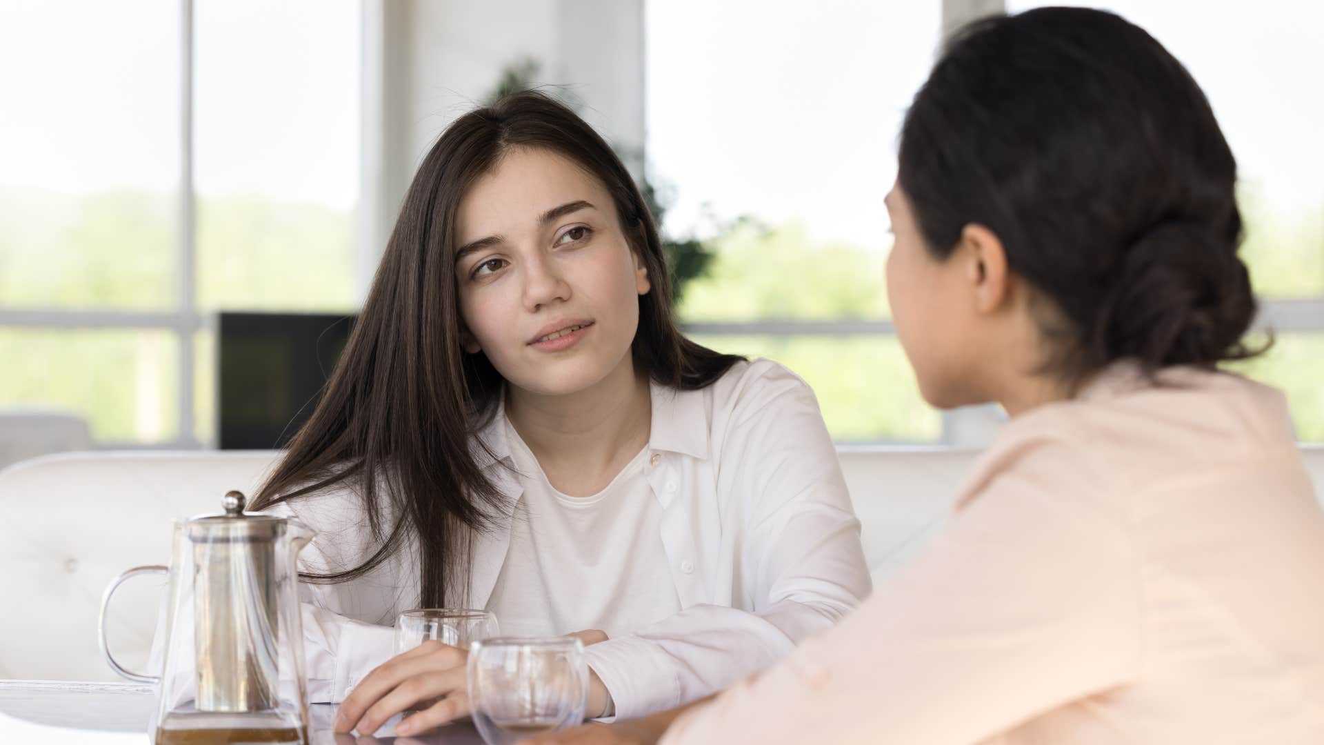 a woman is asked by her wealthy friend about her career