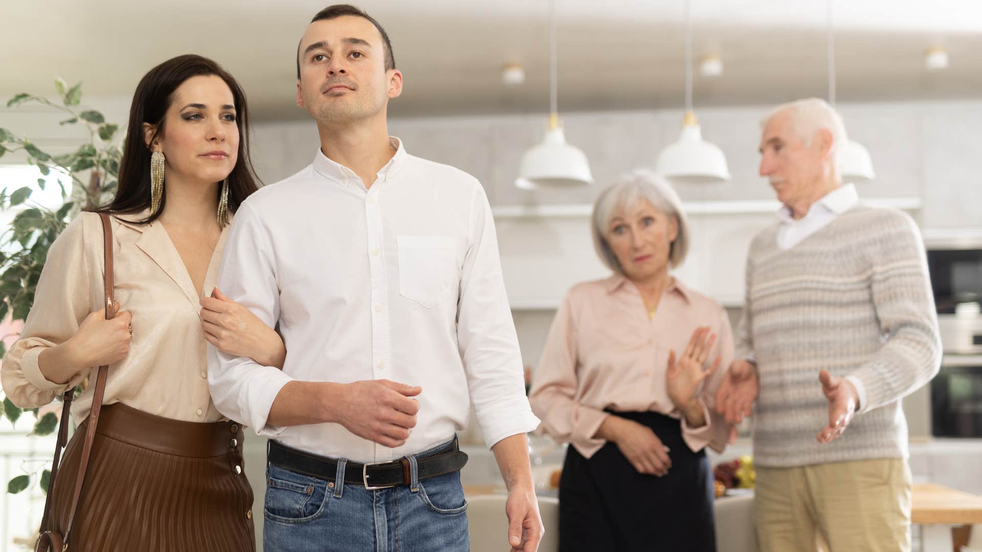 a wealthy couple makes a comment on her daughter and son in laws arrival time to the gathering