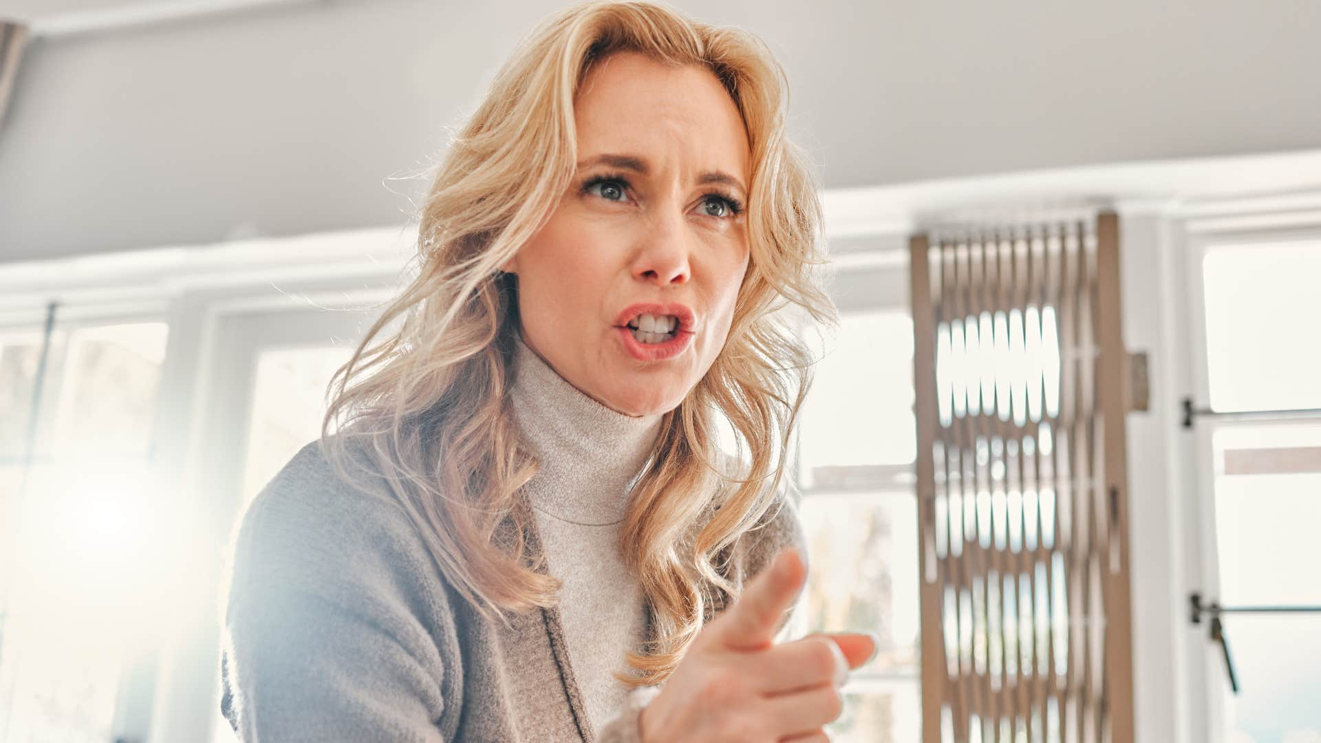 a wealthy woman pulls rank with her friend during a heated argument