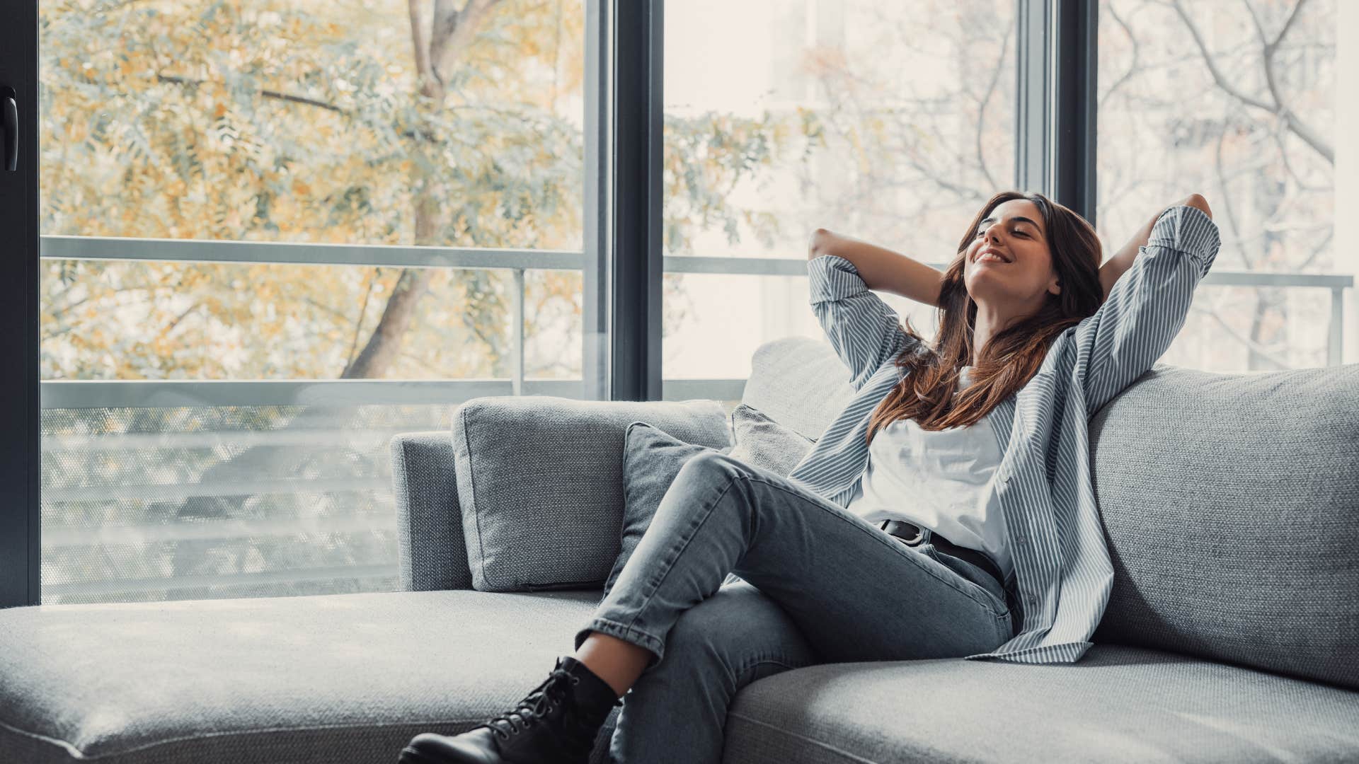 woman relaxing and feeling relieved after canceling plans