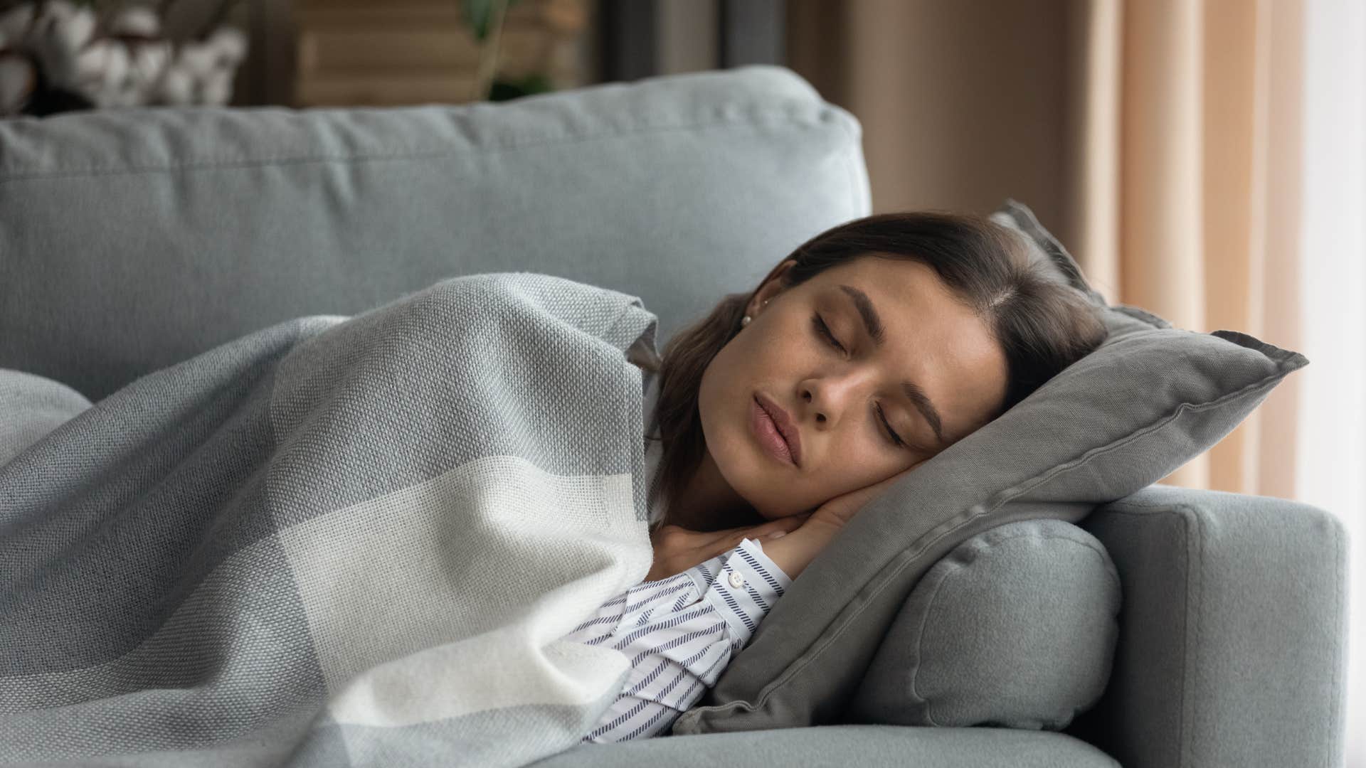 woman taking a nap during the day due to burnout