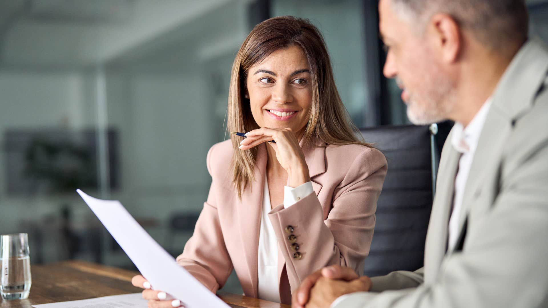 wealthy man meeting with financial advisor