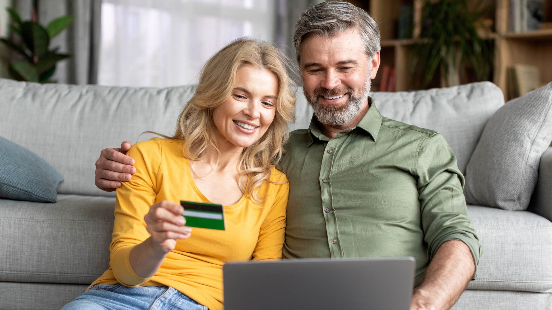 couple buying status symbols at home
