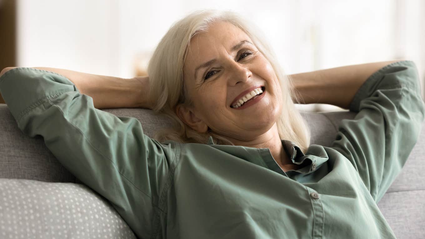 classy carefree older woman relaxing