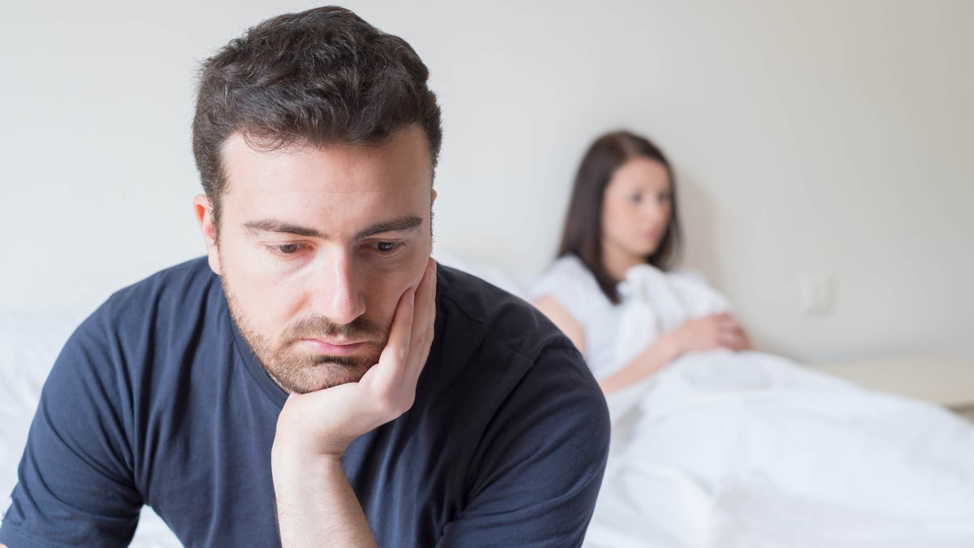 an unhappy man holds a grudge against his wife by giving her the silent treatment