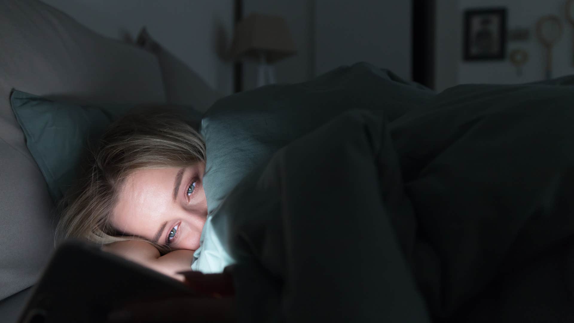 a woman over consumes negative media despite it making her unhappy