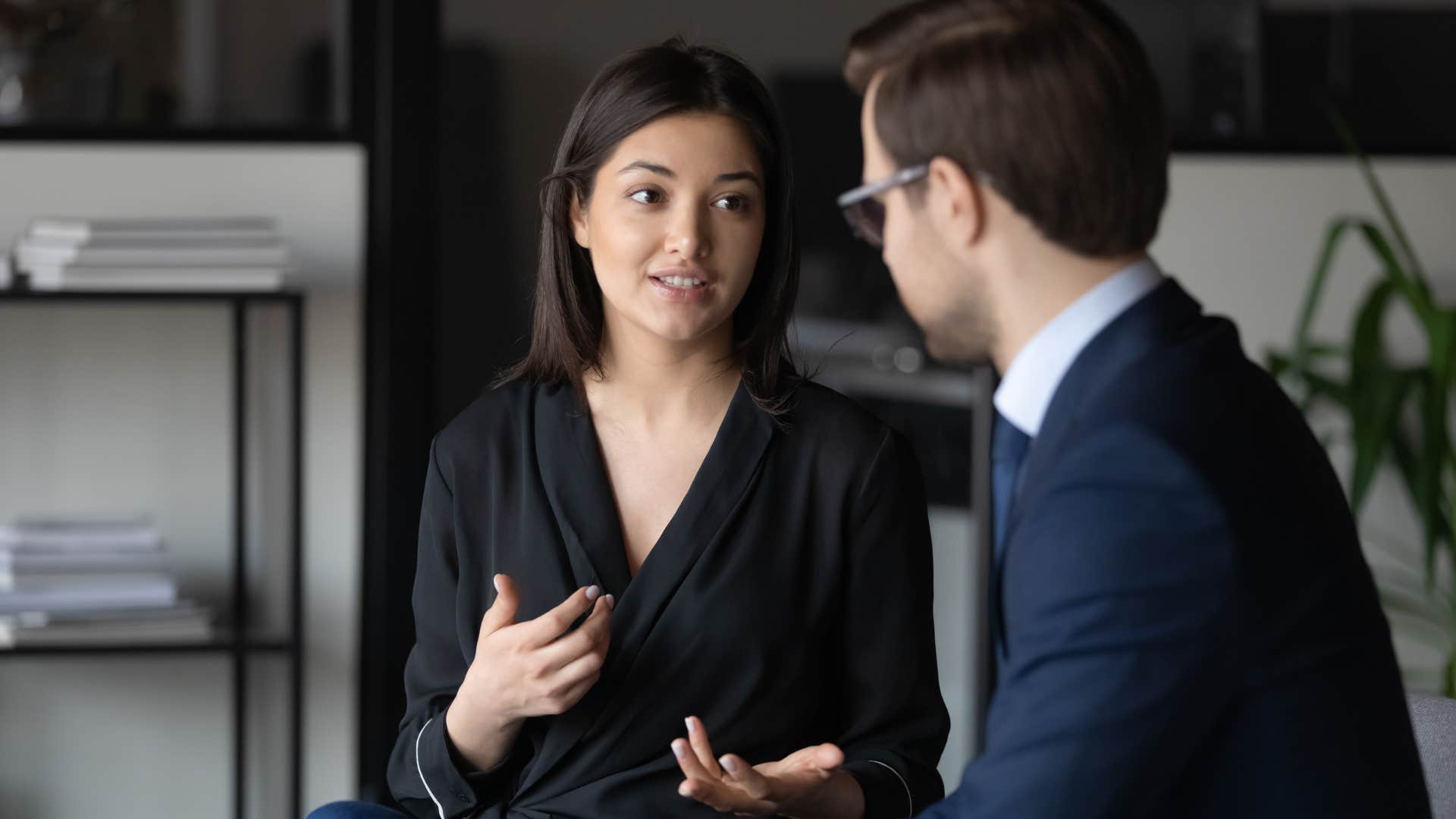 a woman seeks validation from her boss unlike her other colleagues