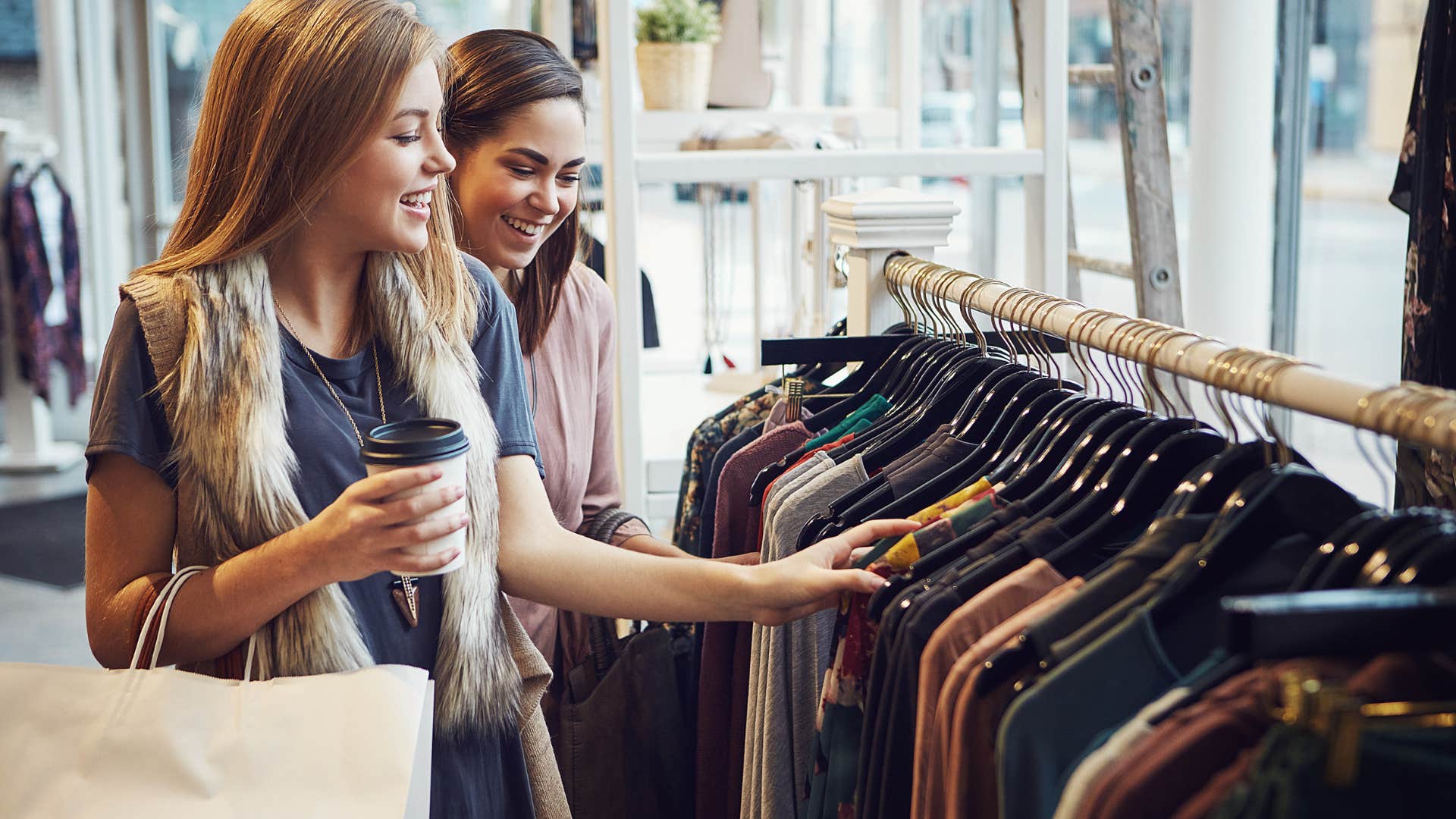 women shopping for designer merchandise