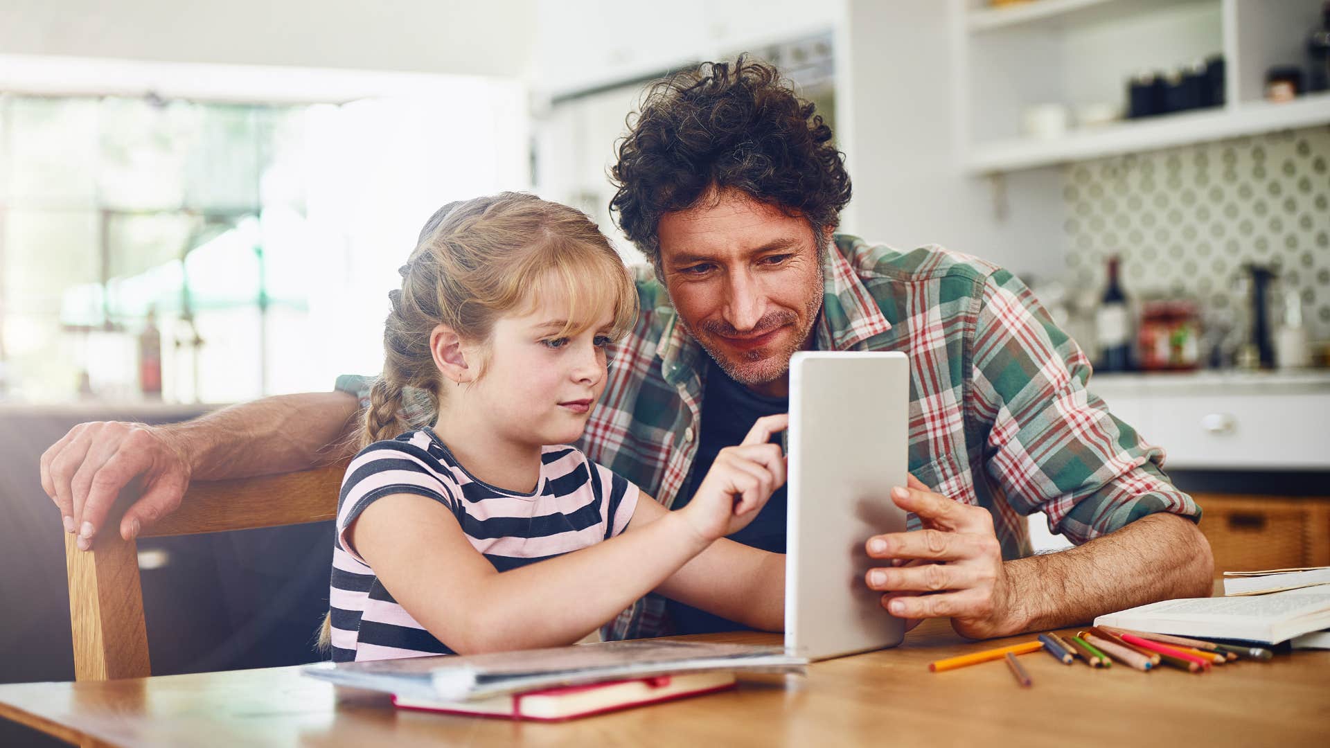 wise parent teaching children value of money by separating wants from needs