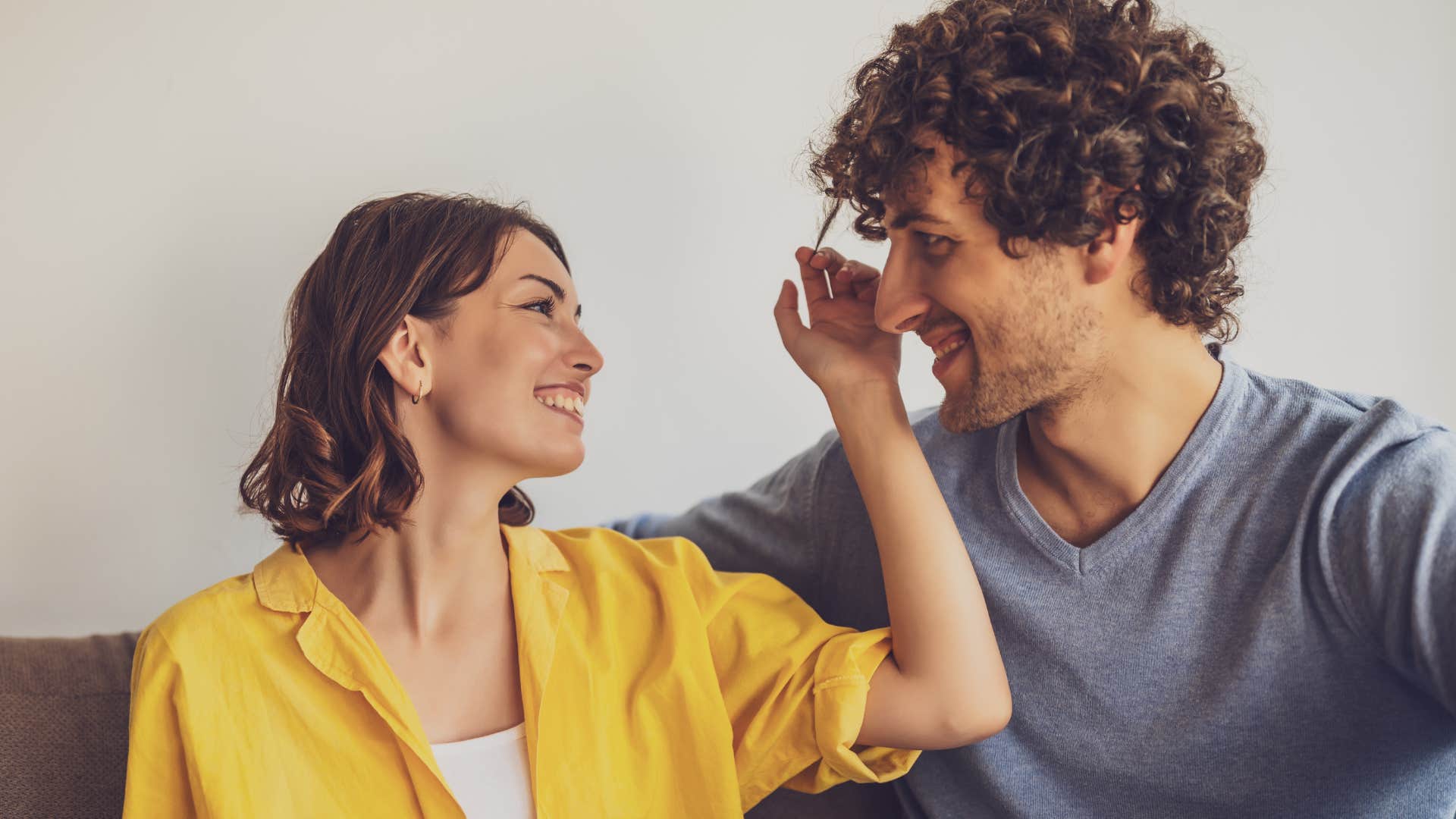 woman with natural attraction skills beign affectionate