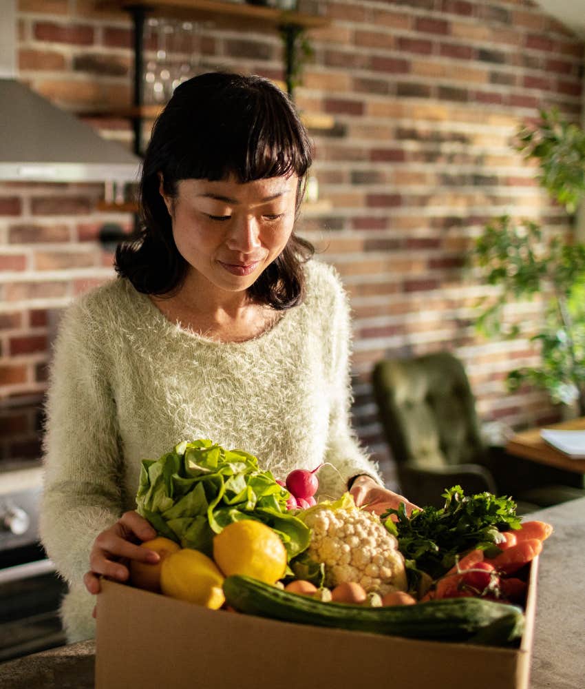 Happy woman with food
