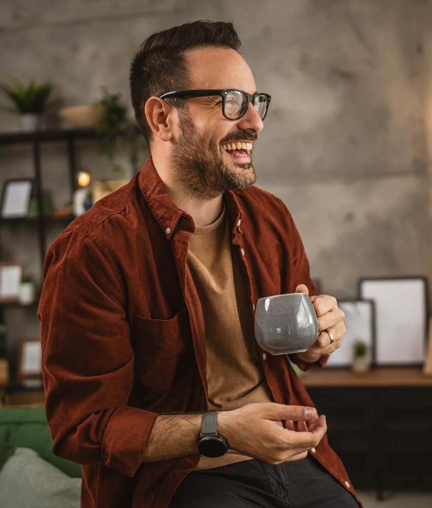 Happy man laughs