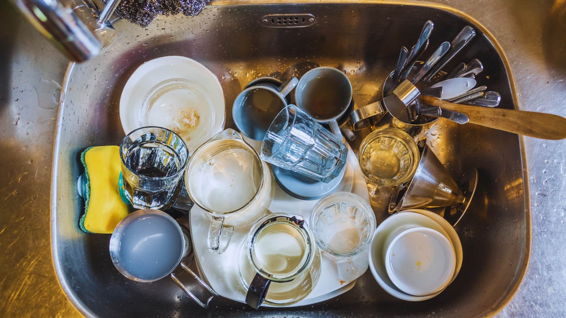 sink full of dishes things you have to accept before becoming mom