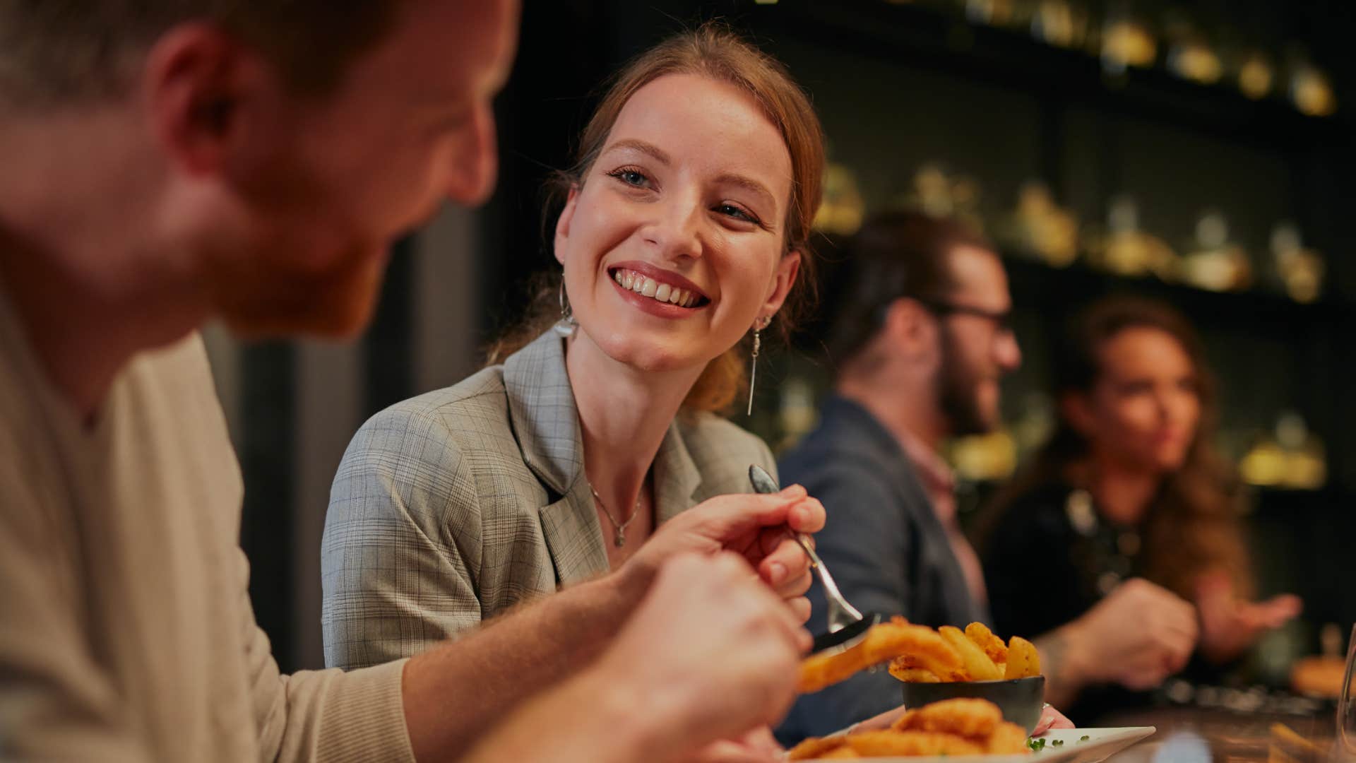 woman attracted to man sitting next to her despite being in a relationship