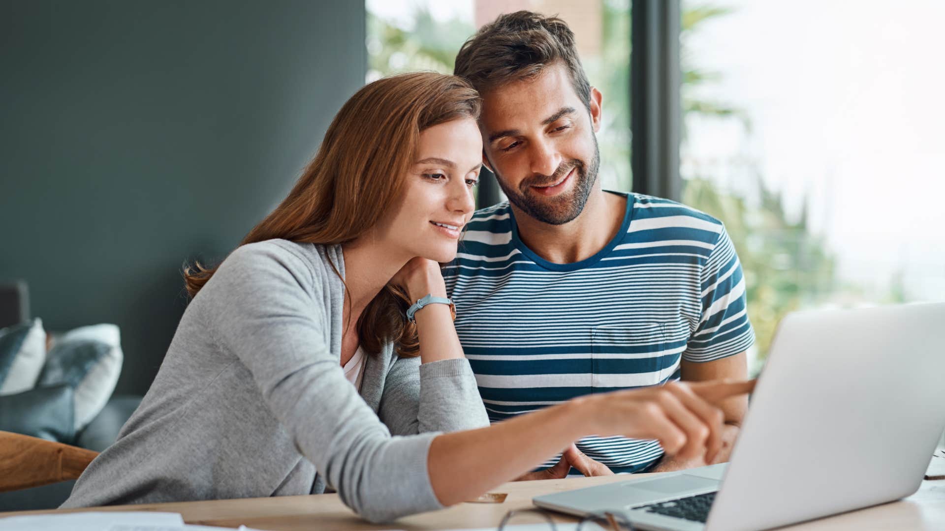 couple making plans together on computer