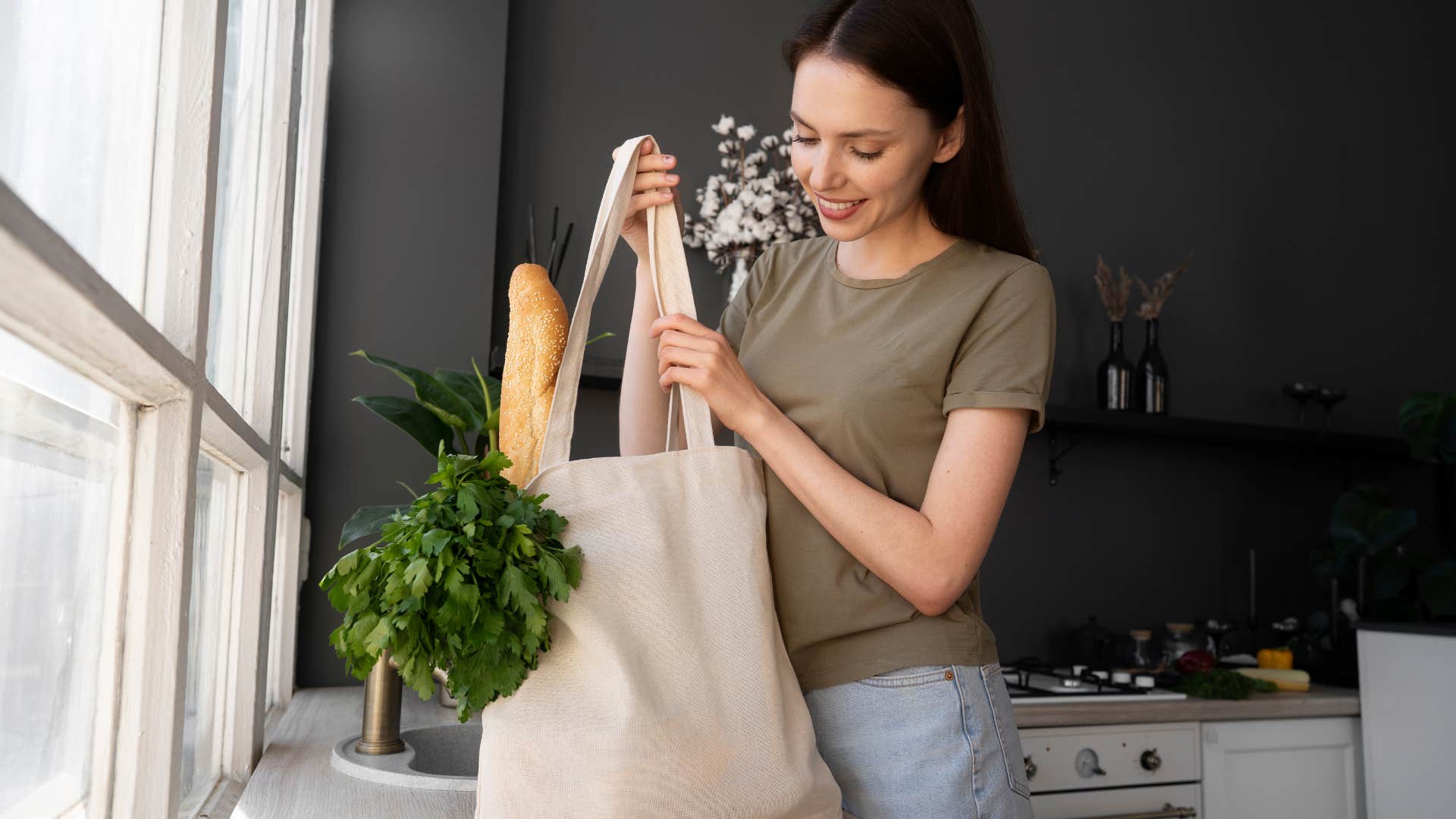 woman looking in her shopping bag collection