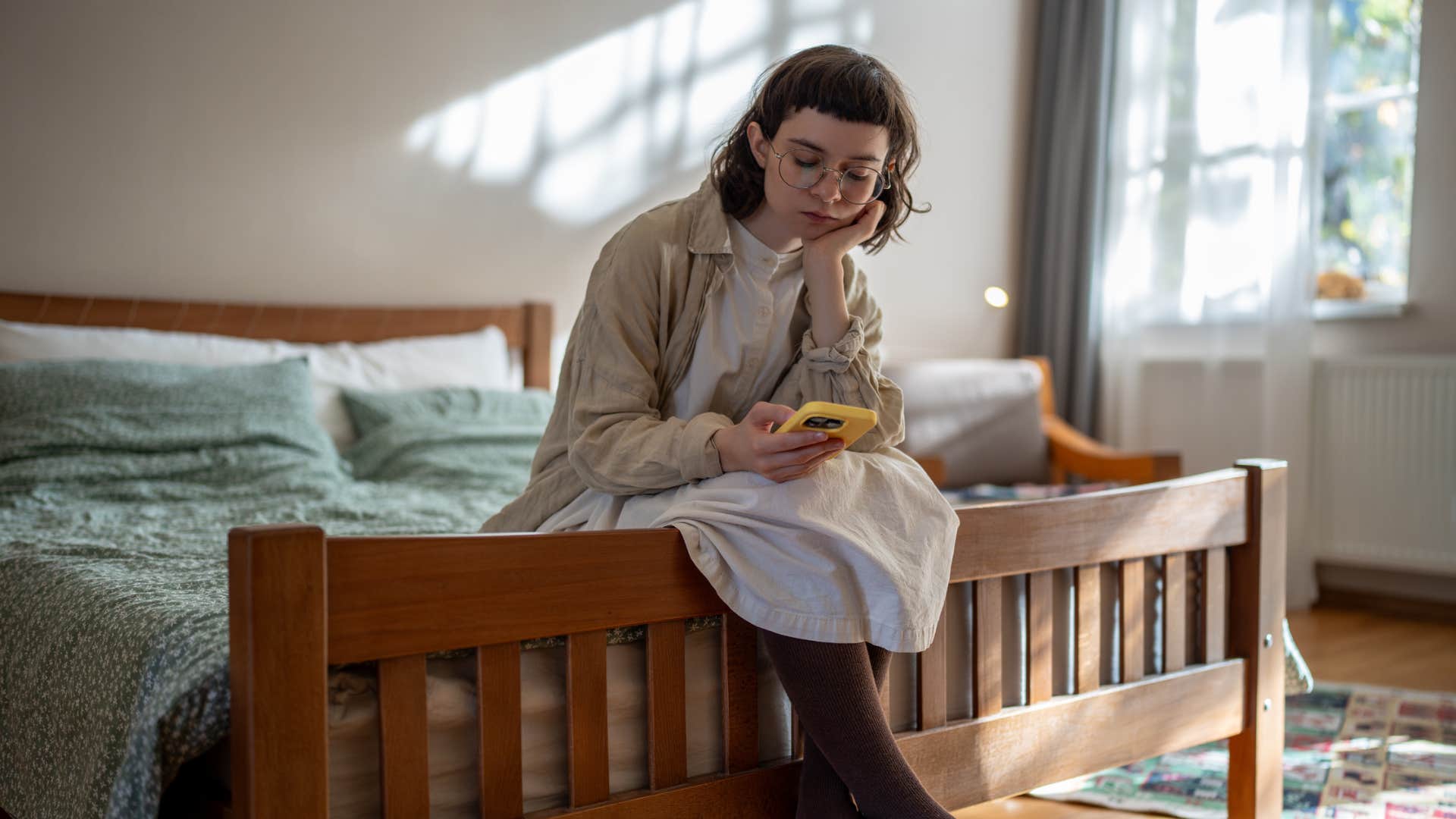 introverted woman in bedroom finding it difficult to express her emotions