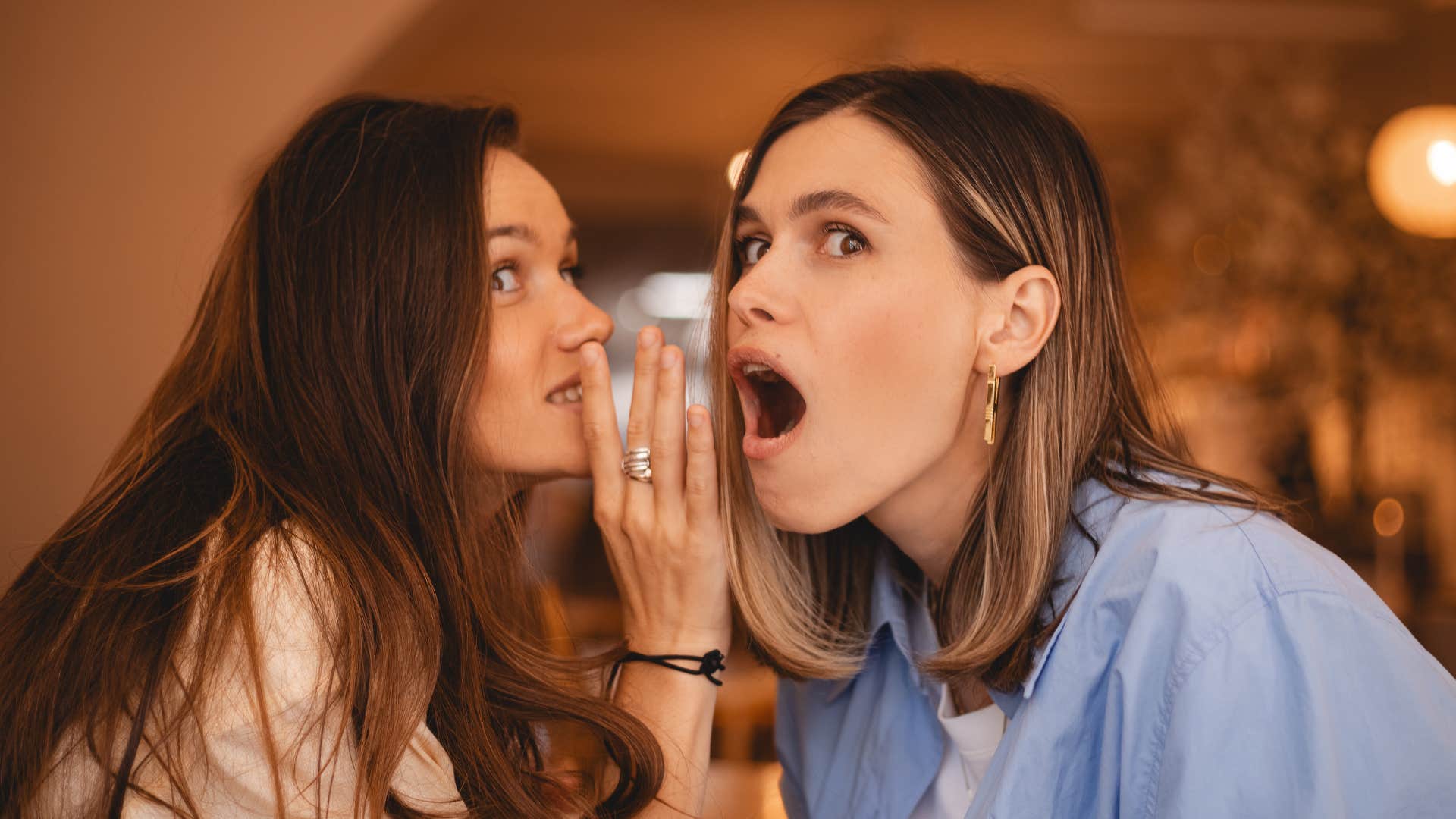 woman telling friend about new relationship
