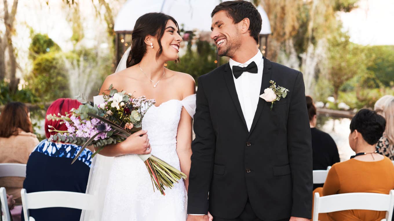 Wife Shares The 7 Controversial Marriage Agreements She And Her Husband Signed Before Tying The Knot bride and groom smiling at each other