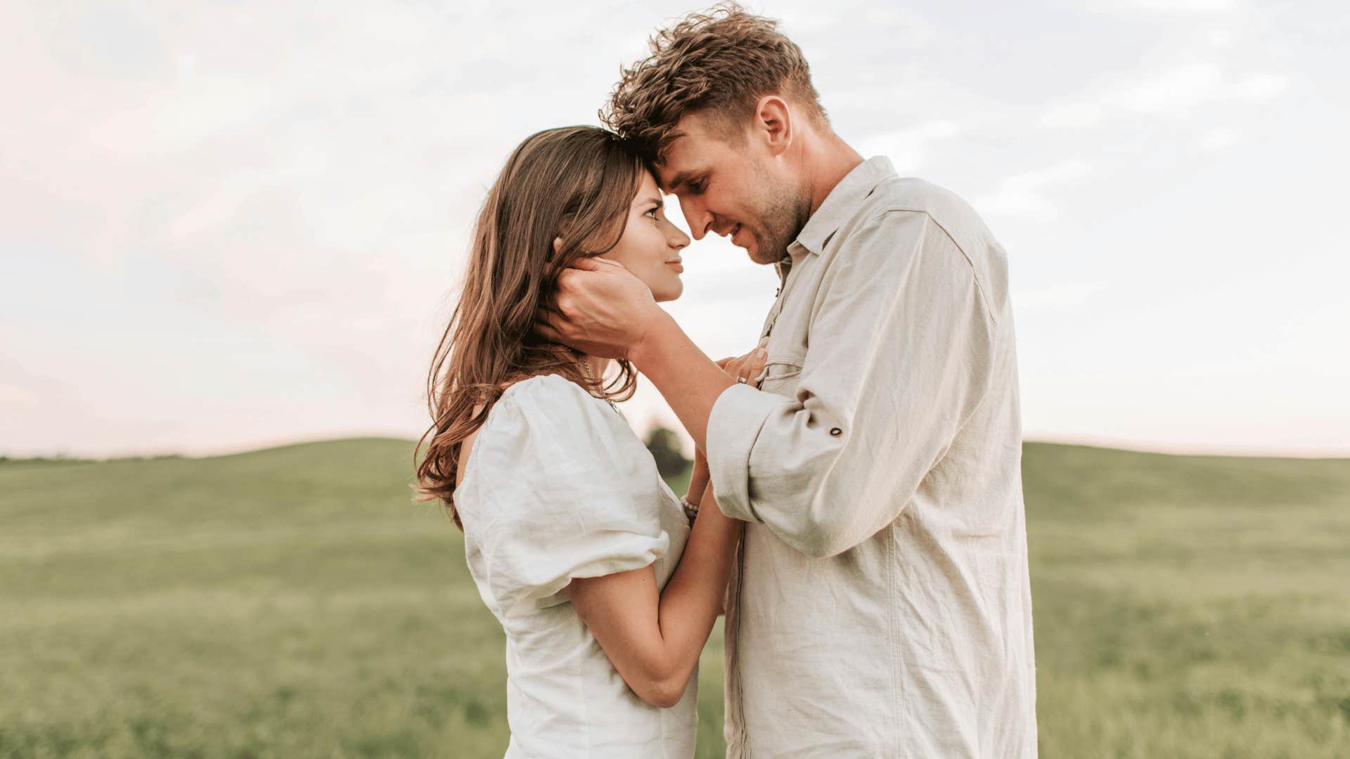 compelling woman standing close to man