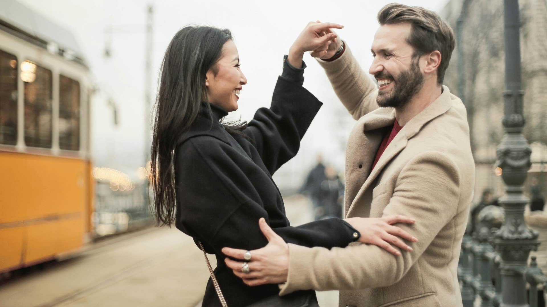 woman playfully teasing man