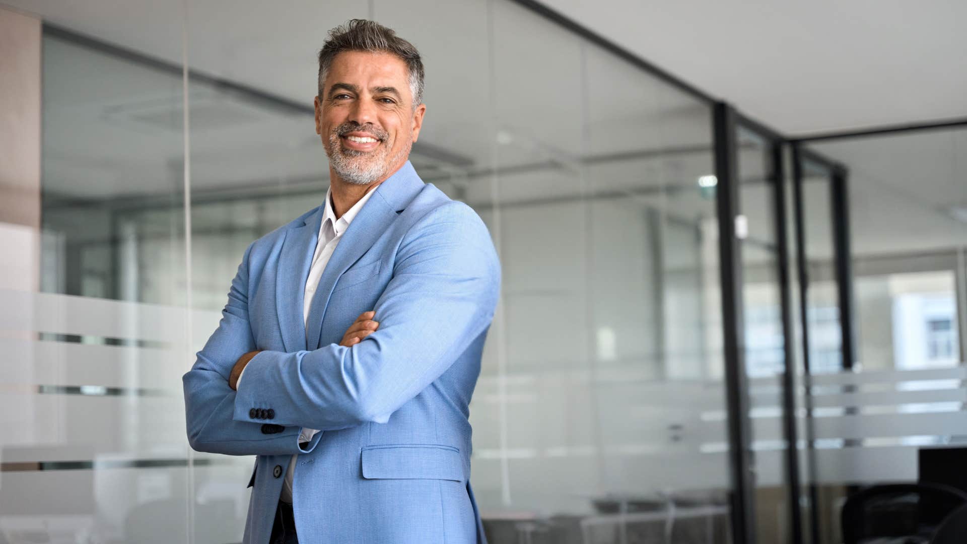 ambitious businessman smiling confidently