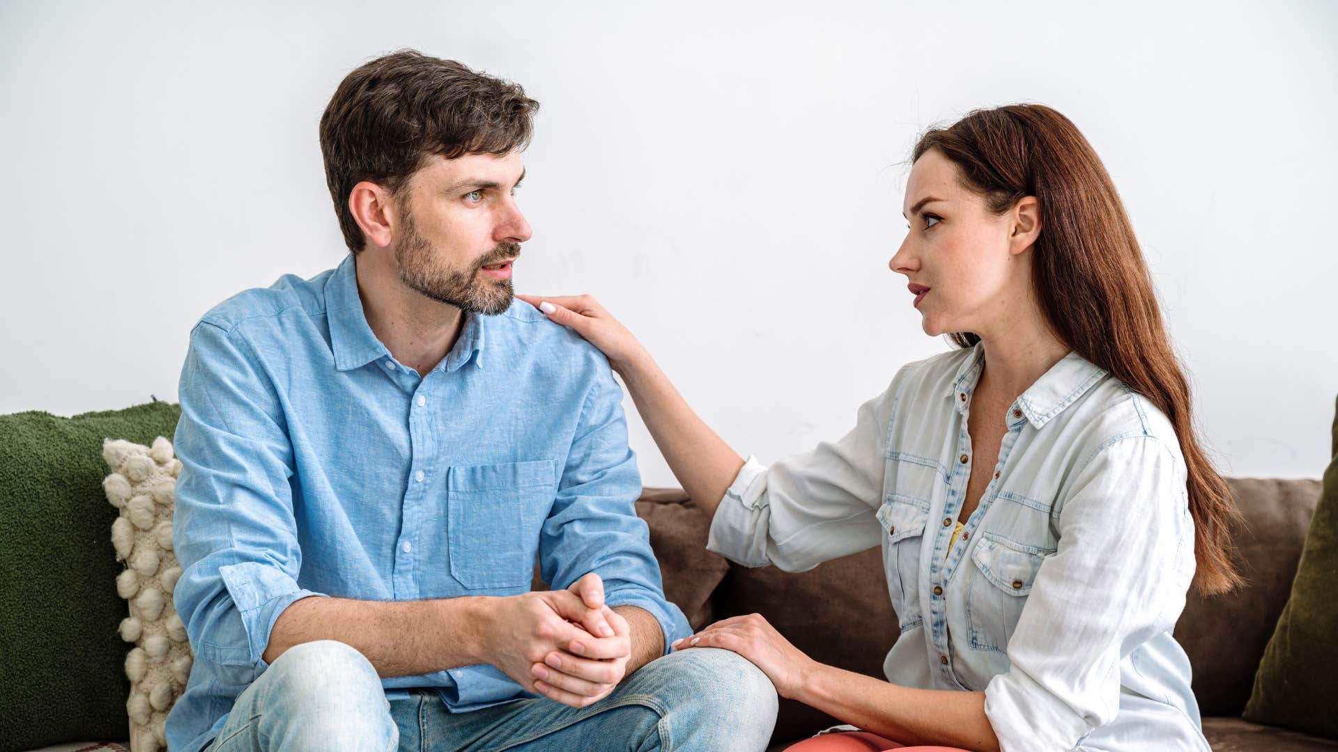 man being honest with woman on a date