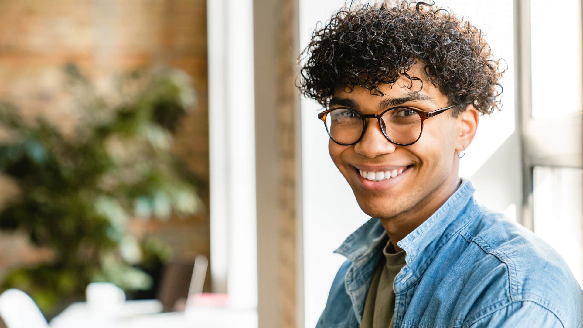 intelligent man smiling confidently