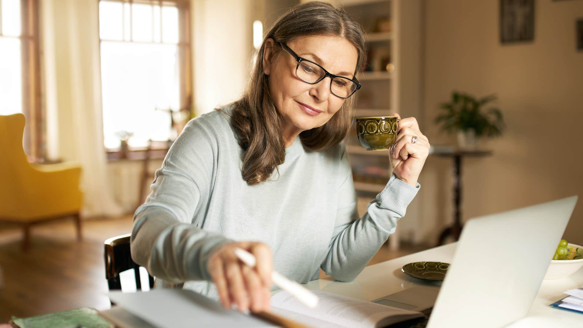 woman working and thinking about efficiency at home