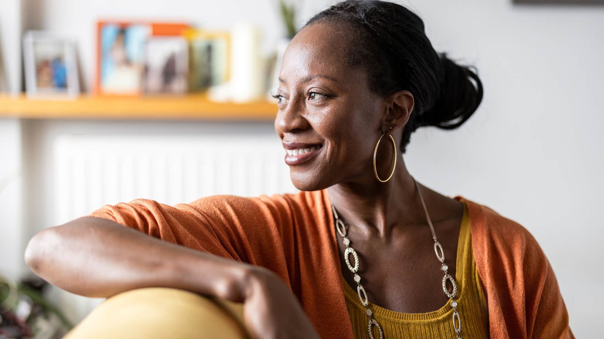 woman who doesn't chase validation looking out a window