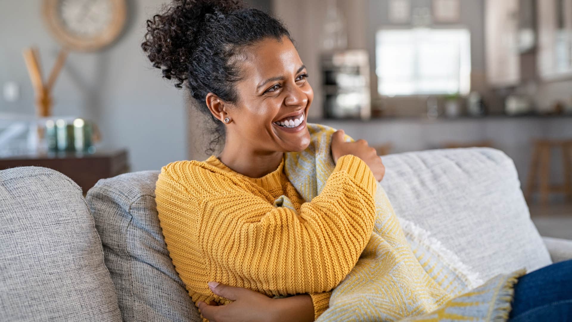 happy woman at home protecting her energy
