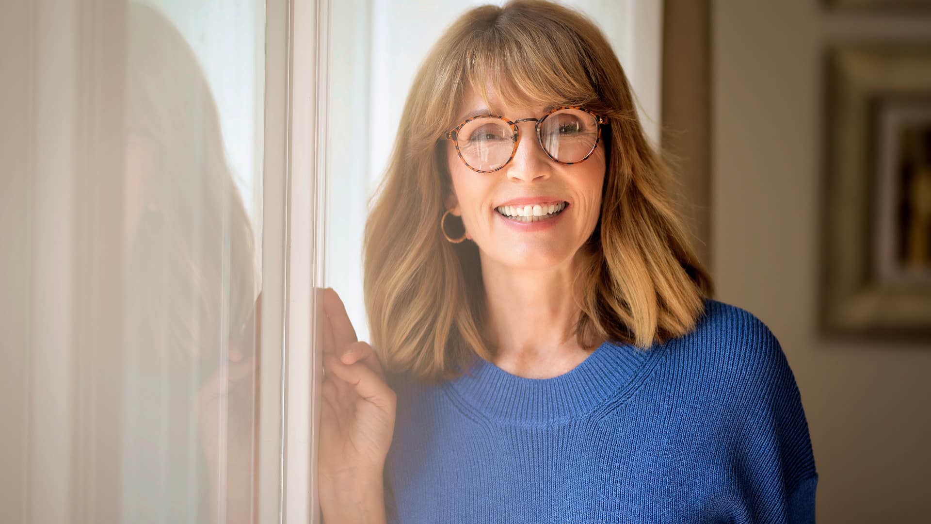 older woman who's tired of wasting time smiling