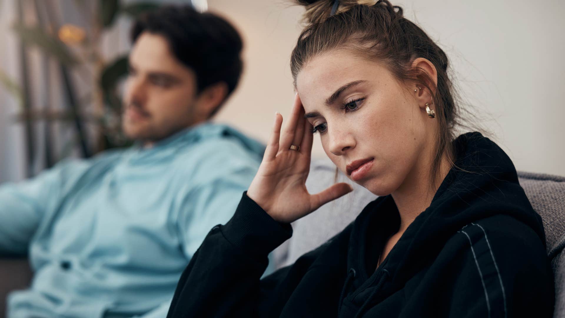 woman who doesn't feel respected turned away from her husband